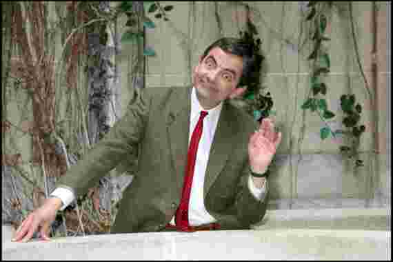 Rowan Atkinson's long-term girlfriend is 26 years younger than him
