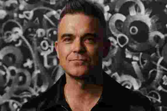 Robbie Williams opens up about his struggles with this hair condition